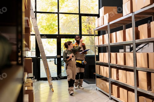Preview: Storage room team looking at cardboard boxes