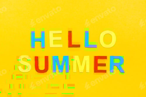 Preview: Hello summer. The inscription of colored carved letters on a yellow cardboard. Top view