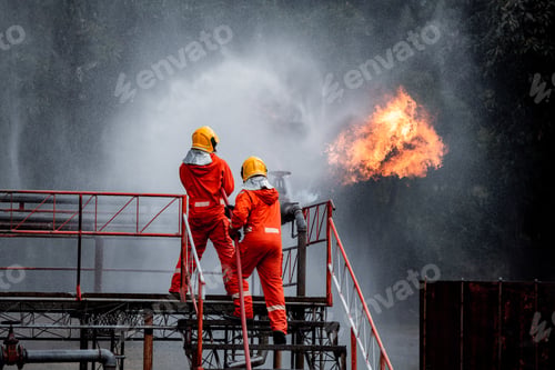 Preview: Firefighters safety using twirl water fog type fire extinguisher to fighting with fire from oil and