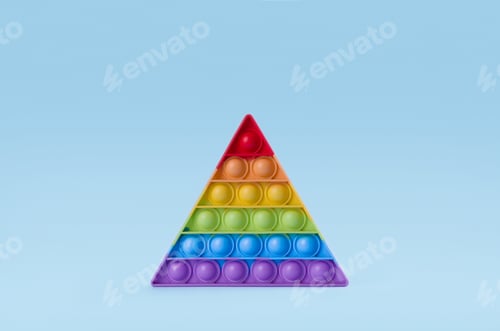 Preview: Bright rainbow toy antistress for children and adults on a blue background