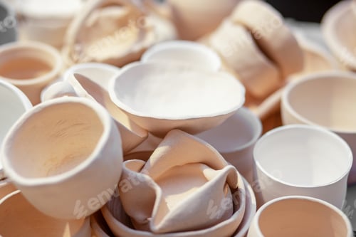 Preview: Lots of pottery pots in workshop. DIY and hobby concept.