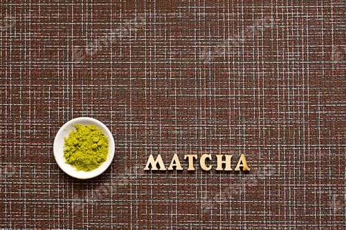 Preview: Japanese Green powder matcha tea on a platter, on a brown background