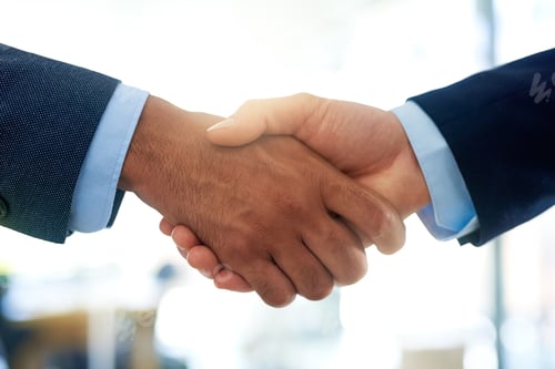 Preview: You sir, have a deal. Cropped shot of two unrecognizable businessmen shaking hands in the office.