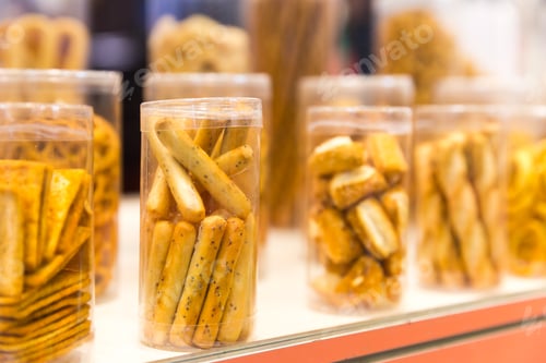 Preview: Pastry in glass jars closeup, bakery case