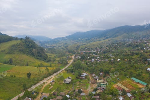 Preview: Immigration refugees residential village houses in countryside, rural area. Local community houses