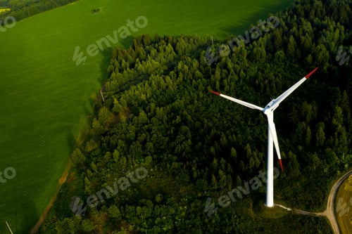 Preview: Windmills on the background of forests and fields. Windmill in nature.Belarus