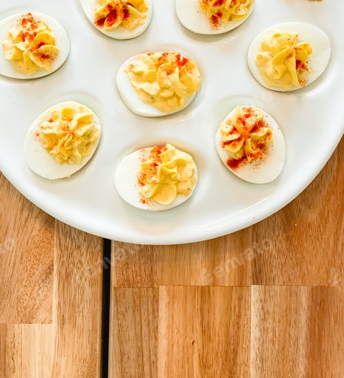 Preview: Deviled eggs on an egg platter on the table for Easter lunch / brunch with the family