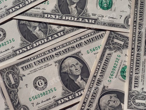 Preview: Pile of 1 American dollar banknotes - inflation and economy concept