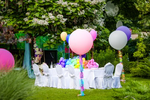 Preview: Birthday table with rainbow balloons. Summer holiday in the park