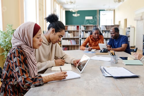 Preview: Multi-ethnic People At School For Migrants