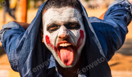 Preview: Close-up portrait of a horrible scary zombie man. Horror. Halloween.