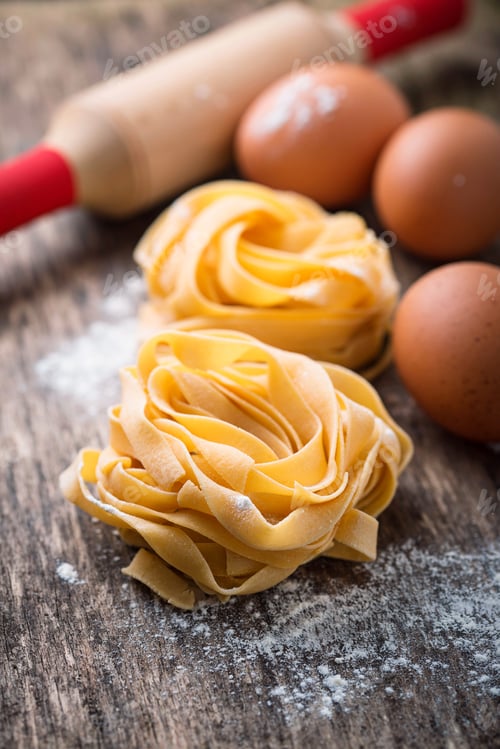 Preview: Raw pasta tagliatelle and eggs