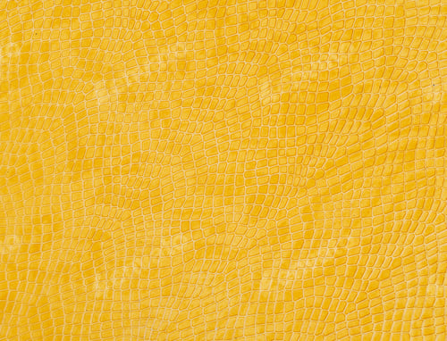 Preview: Closeup shot of a patterned leather yellow surface - perfect for background