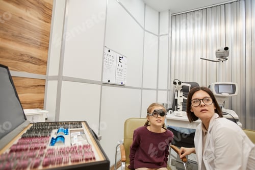 Preview: Little Girl at Lens Fitting