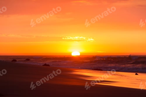 Preview: Ocean sunset on the beach and the Pacific Ocean in Mancora, Peru