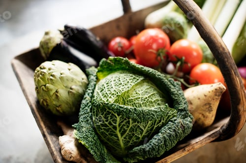 Preview: Closeup of various fresh vegetable in wooden basket