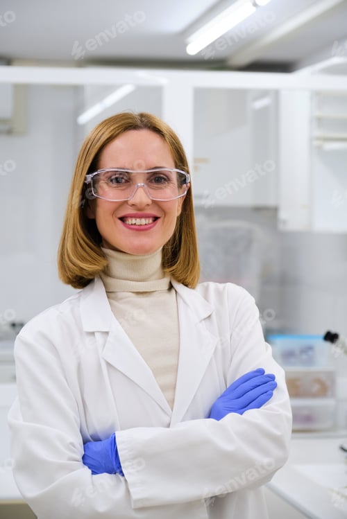 Preview: Female professional researcher smiling and looking at camera.