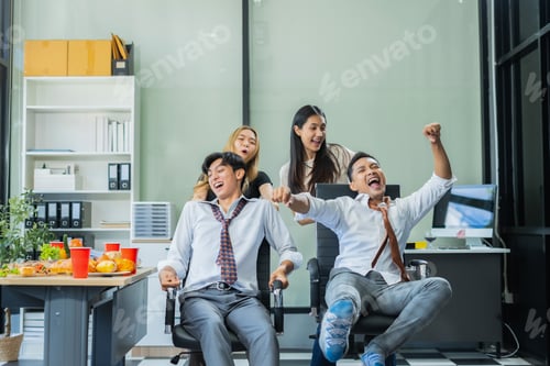 Preview: Celebration successful deal and pizza in the workplace.