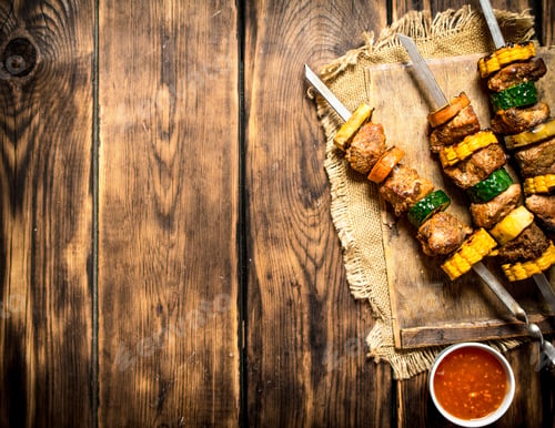 Preview: Shish kebab of meat and vegetables with the sauce.