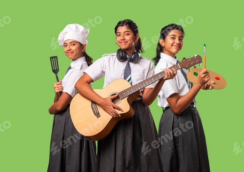 Preview: Indian asian schoolgirl in school uniform and career concept