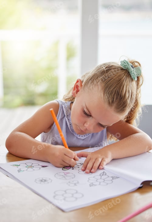 Preview: Education, art and girl learning to draw at a table, having fun with colors and paper sketch in her