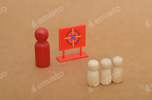 Preview: Focused Leadership Concept with Red Figure and Observing Group by Target