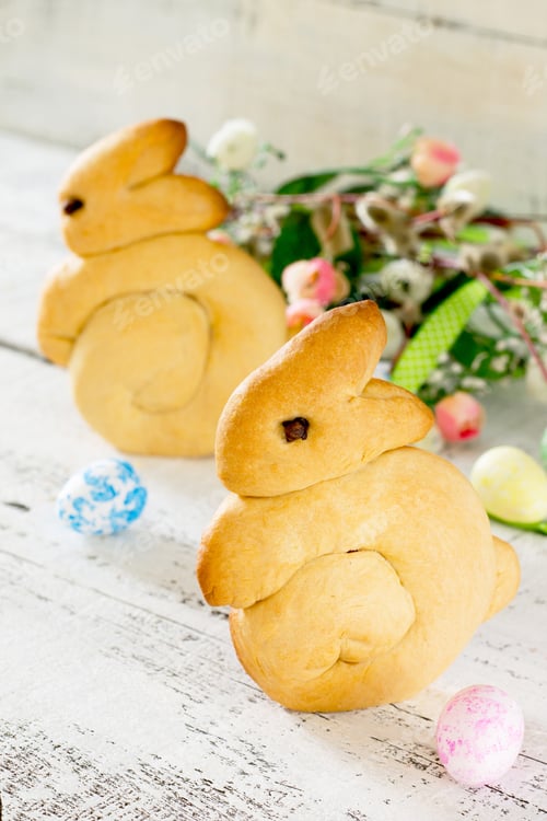 Preview: Baking Easter rabbits on a white wooden table