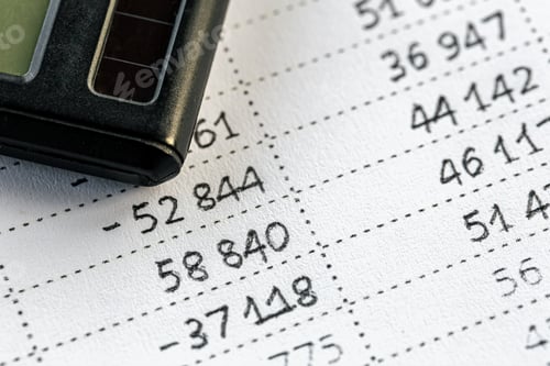 Preview: Calculator and numbers on paper closeup, finance concept.