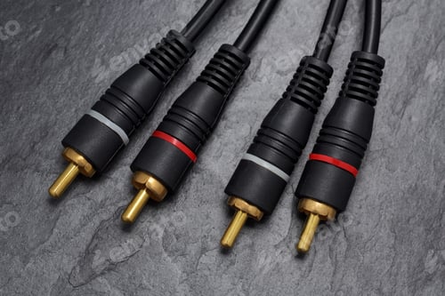 Preview: RCA connector for audio signal on black slate background.