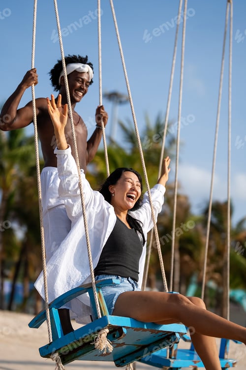 Preview: Couple enjoying their tropical vacation with peace of mind, secured by reliable travel insurance