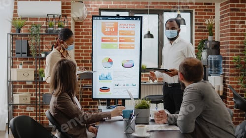 Preview: African american workmates presenting marketing strategy