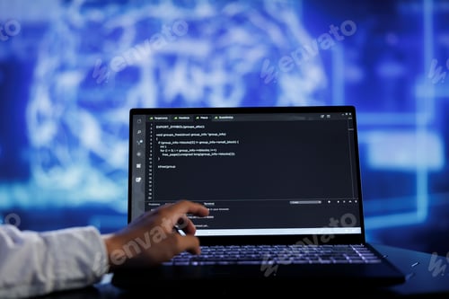 Preview: Expert writes AI code on laptop