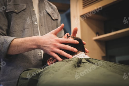 Preview: Man with a beard visiting barbershop