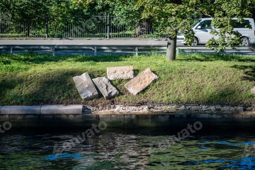 Preview: Riverfront restoration project with granite block renewal and erosion prevention, shore maintenance