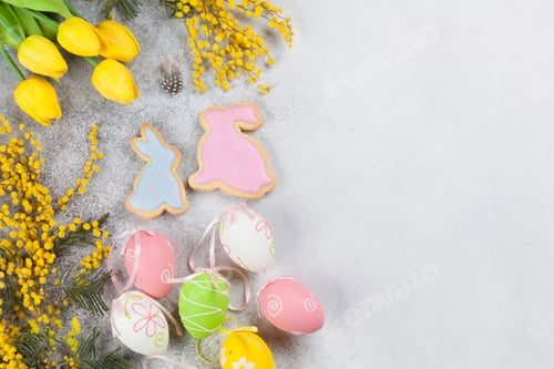 Preview: Easter eggs and yellow flowers. Greeting card