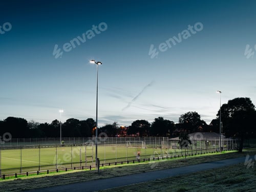 Preview: Football pitch at dusk, Manchester, England