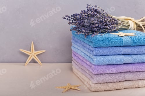 Preview: Stack of Colorful Bath Towels with Lavender Flowers
