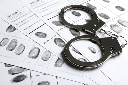 Preview: Handcuffs and fingerprint record sheets, closeup. Criminal investigation