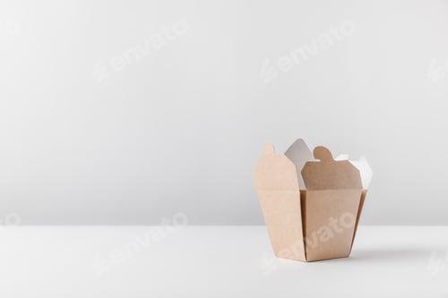 Preview: one open noodles box on white surface