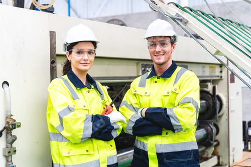 Preview: Group of various national engineer professional successful team corporate workers in factory