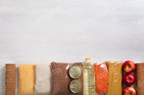Preview: Many different products and space for text on white wooden background, flat lay. Food donation