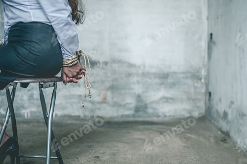Preview: woman hands bound. Women were handcuffed and Sitting on a chair.woman tied hand to a chair.Crime Con