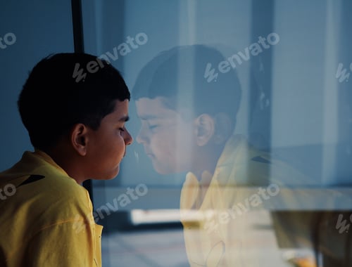 Preview: Kid in his thoughts and reflection