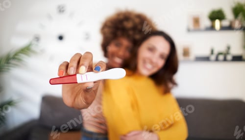 Preview: Close up black woman hand showing positive predictor to camera. Young multi-ethnic lesbian LGBT.