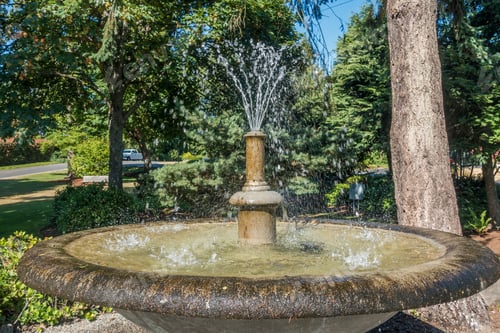 Preview: A Fountain Sprays Water In The Residential Neighborhood Of Normandy Park, Washington.