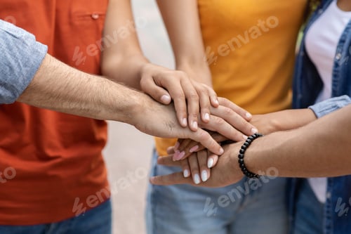 Preview: Unity Concept. Group Of Unrecognizable Young People Joining Hands Together