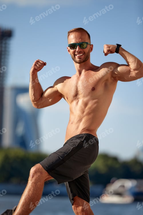 Preview: Athletic man running and doing functional workout outdoors - Sportive adult male with sportswear