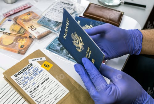 Preview: Expert police officer examining American passport of a evidence bag in laboratory of criminology