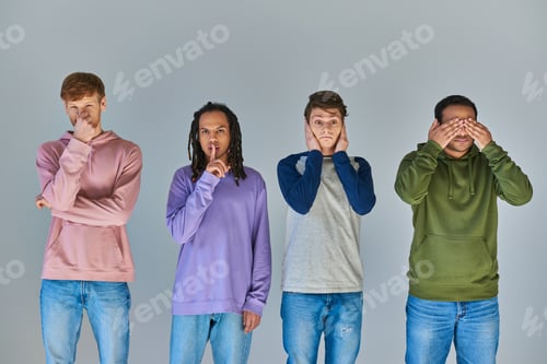 Preview: four men showing gestures of four monkeys, hear, see, speak and do no evil, cultural diversity
