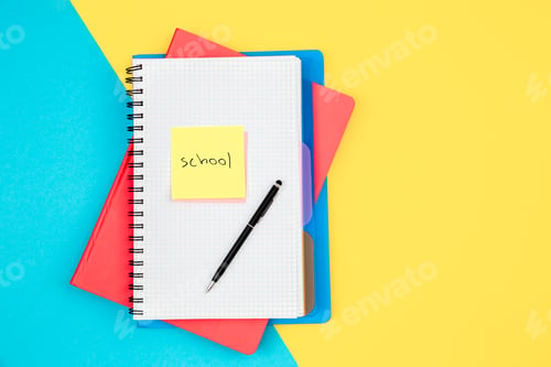 Preview: Notebooks, pen and paper reminder with the word school.